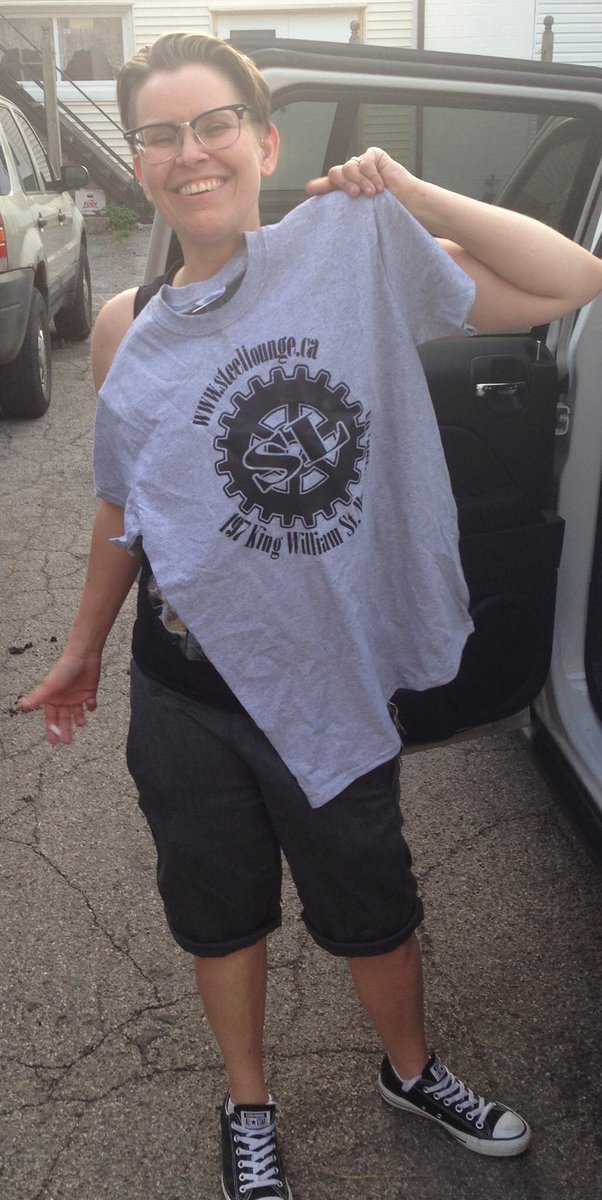 Here is Emily holding up one of the shirts we printed for The Other Team which <a href="/steel_lounge/">Steel Lounge</a> sponsors!