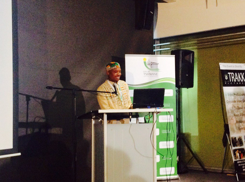 CityTshwane's tweet photo. In African regalia, @Roots_SJM takes podium to speak about building foundation 4 low carbon energy future #TRIS2016 https://t.co/vUO4xTPp0u