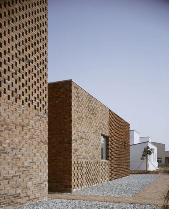 We love this modern #brick home design in China, bringing an innovative twist to tradition! What do you think?