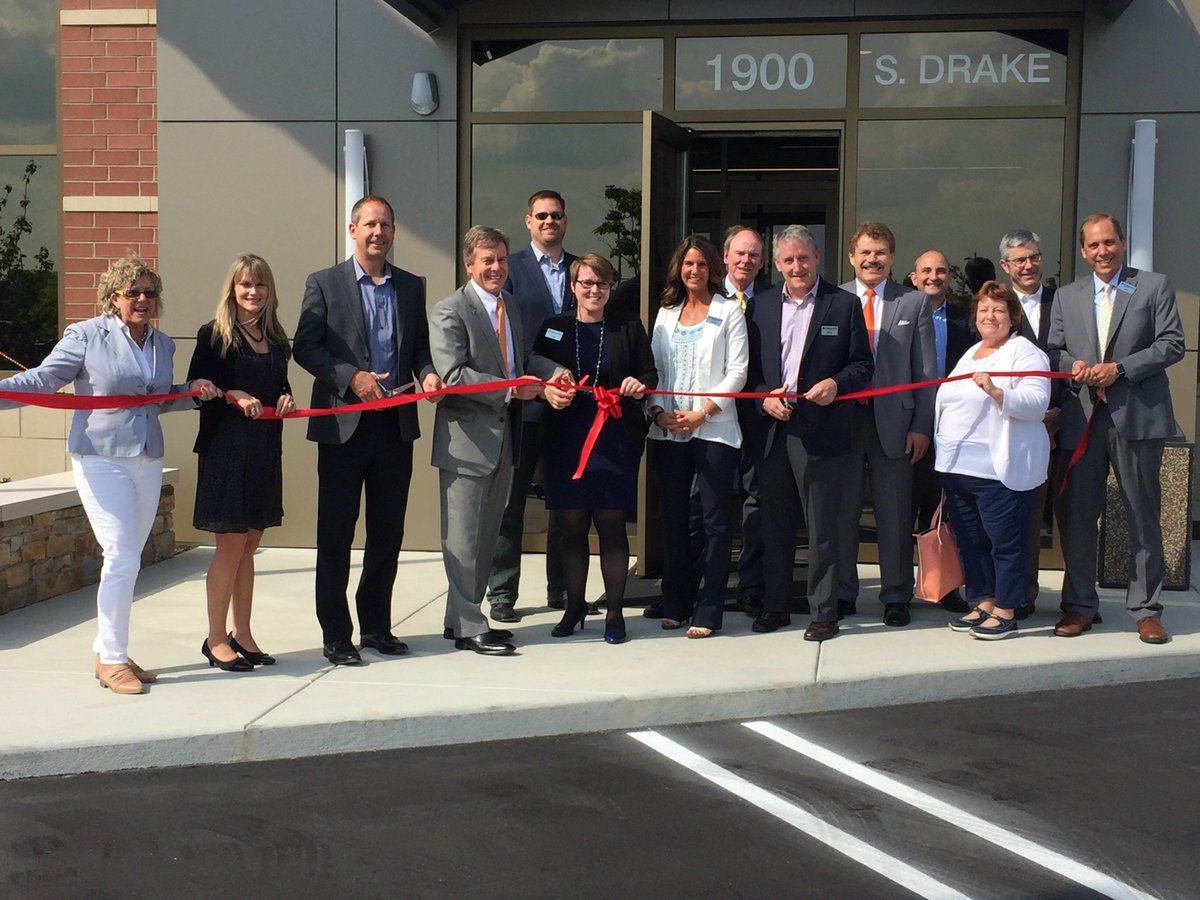 A big red ribbon ties the bow on Corner@Drake open house! <a href="/ConsumersCU/">Consumers Credit Union</a> newest office -17 in #WestMichigan!