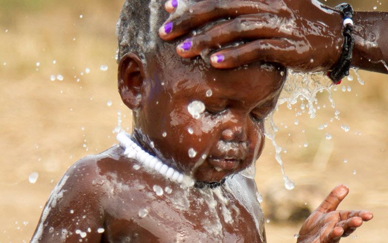 Bath time for 2-year-old Nyagame! We're working to provide clean water to families displaced by war in #SouthSudan