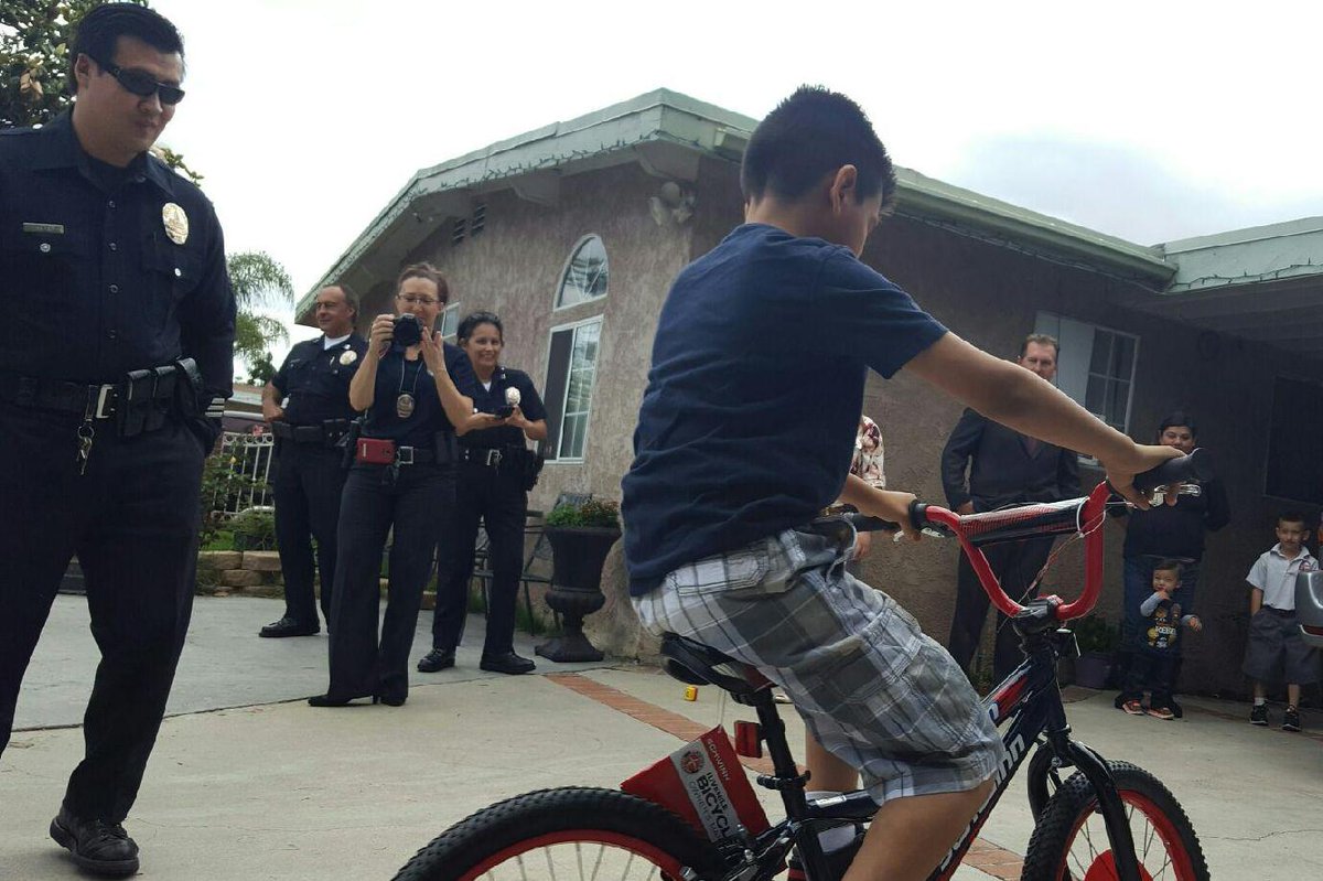 #LAPD Foothill Detectives join together with #Target helping 8-yr old boy to ride again after theft of his bike.