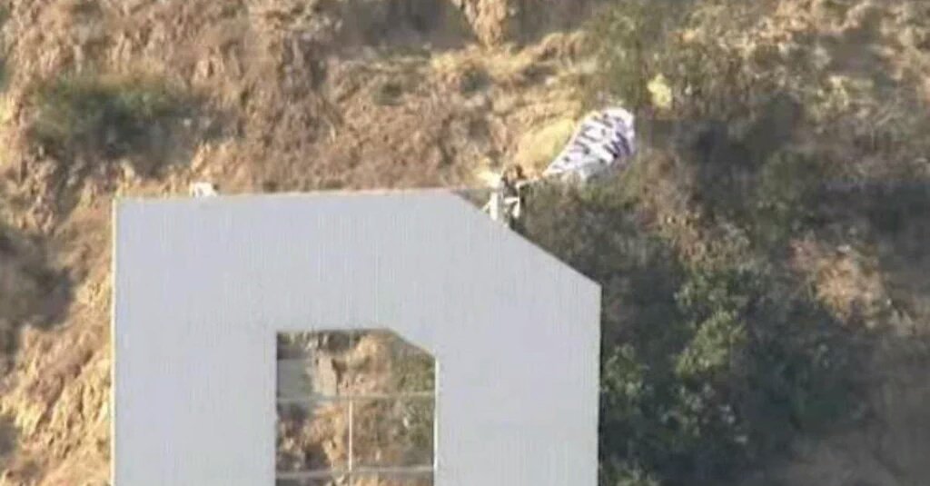 TheLAScene's tweet photo. YouTuber @Vitalyzdtv was taken into custody a few minutes ago for trespassing onto the #HollywoodSign. #stupidstunts https://t.co/p2pWcHbvMj