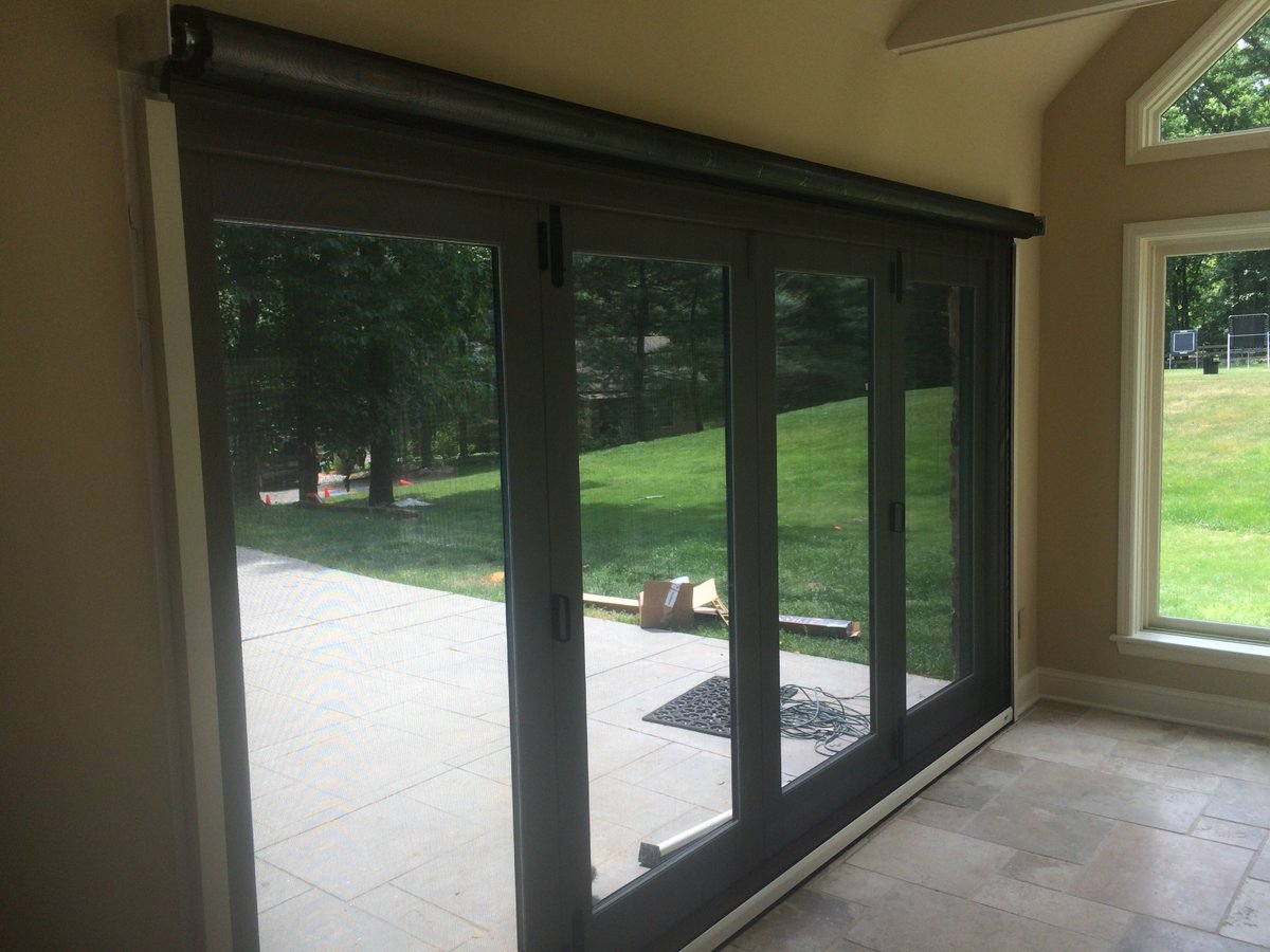 SpartanGroupHC's tweet photo. Also consider adding a #PhantomScreen to your #FoldingDoor to maximize its potential #construction #SCGHC #NJ https://t.co/ZgKVLbkyEm