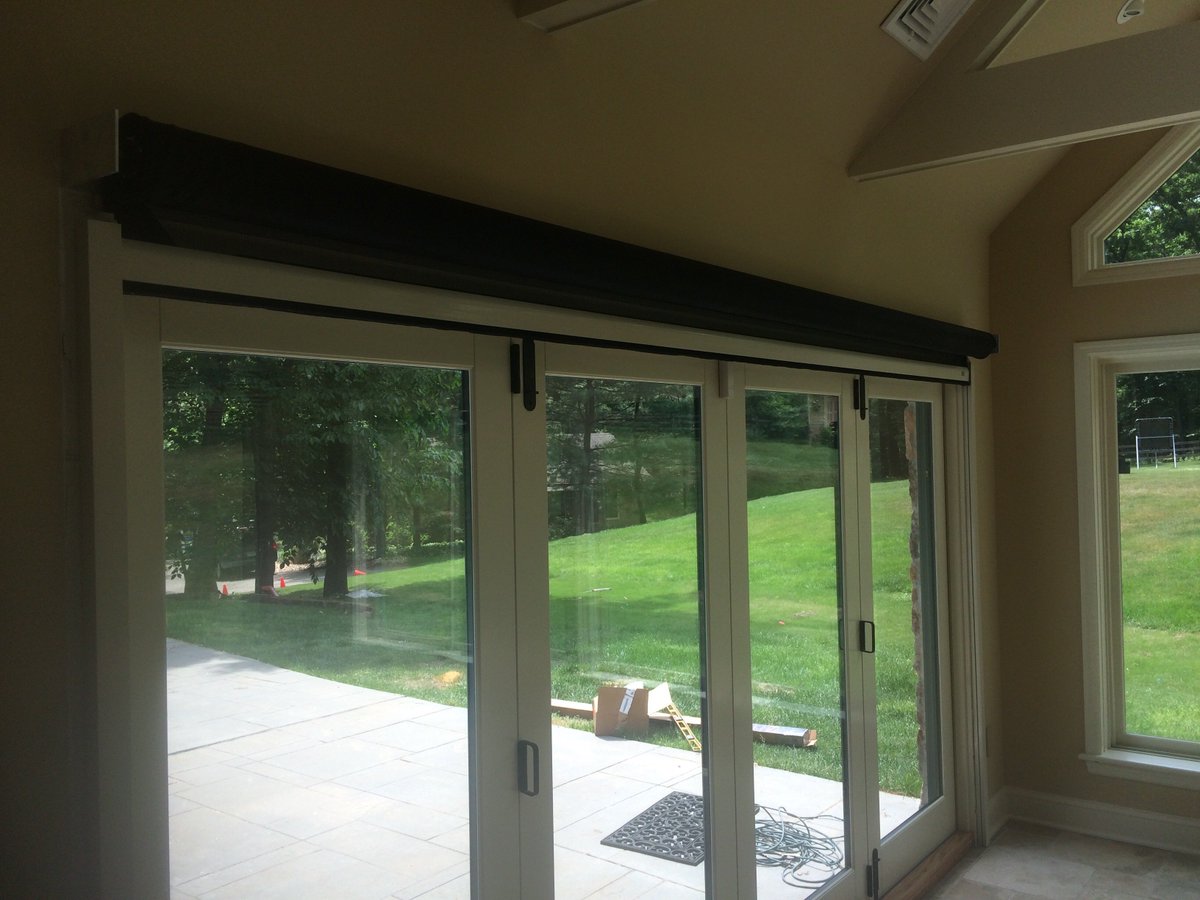 SpartanGroupHC's tweet photo. Also consider adding a #PhantomScreen to your #FoldingDoor to maximize its potential #construction #SCGHC #NJ https://t.co/ZgKVLbkyEm