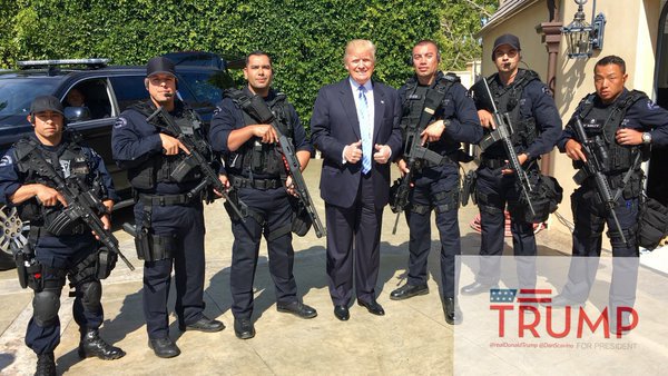 BobNNeil1's tweet photo. @DanScavino @realDonaldTrump did you ask for 6 midget swat members to make him look bigger? Or just a coincidence? https://t.co/JlBntSMMb0