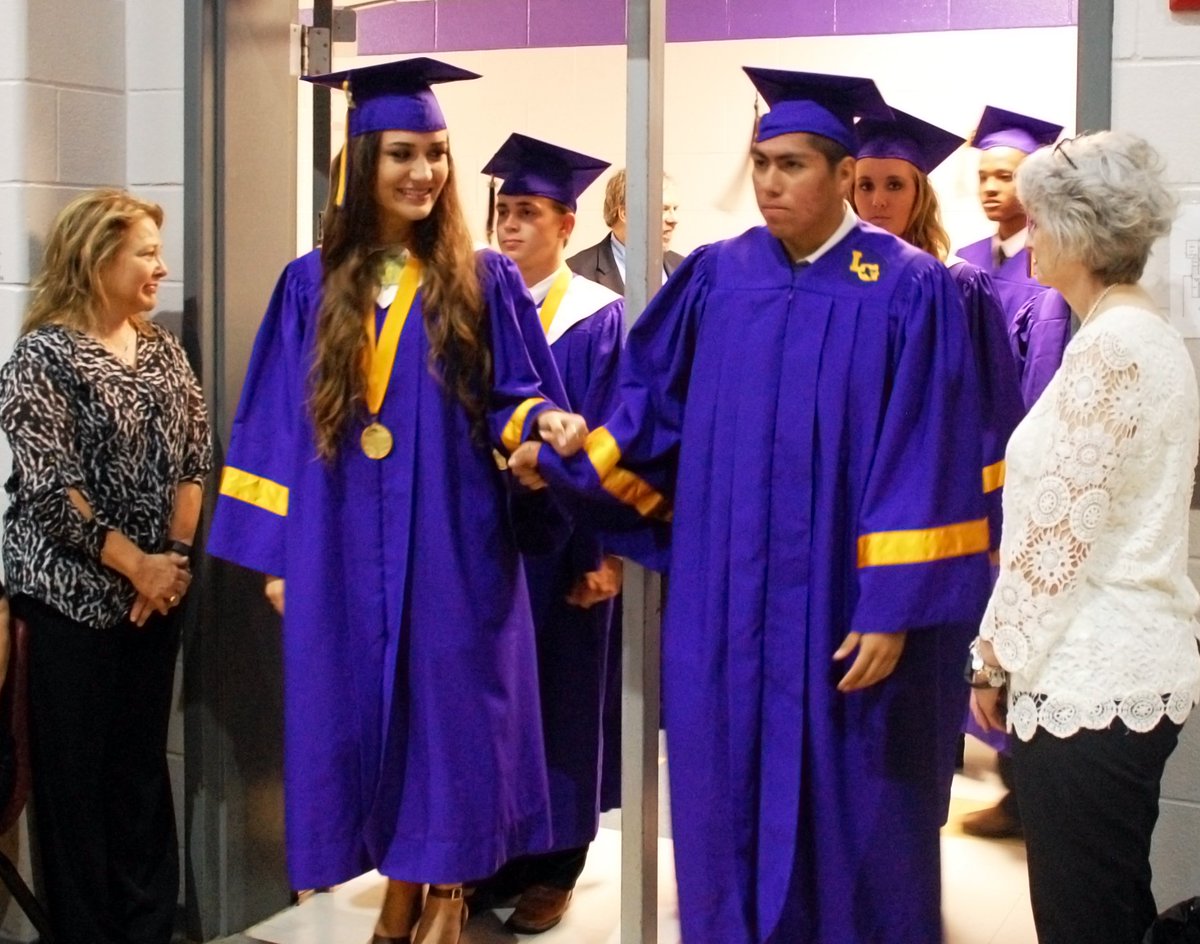 LGLeopardSpots's tweet image. Rain sure didn't dampen these grads' spirits.