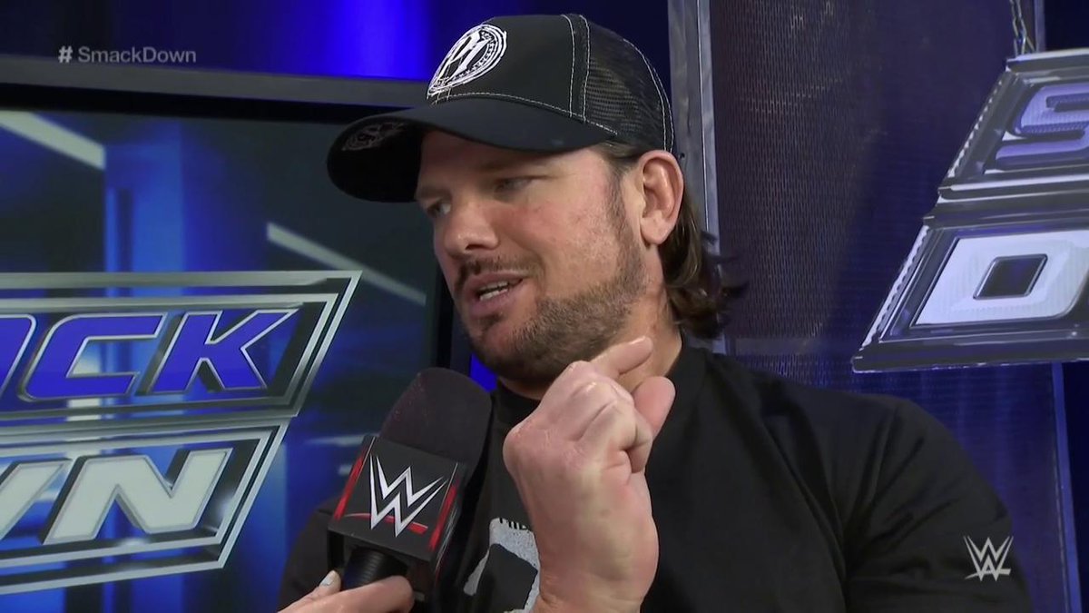 WWEUniverse's tweet photo. "I was this close to beating @WWERomanReigns for the @WWE Championship, but I failed." - @AJStylesOrg #SmackDown https://t.co/pCs9stvQhE