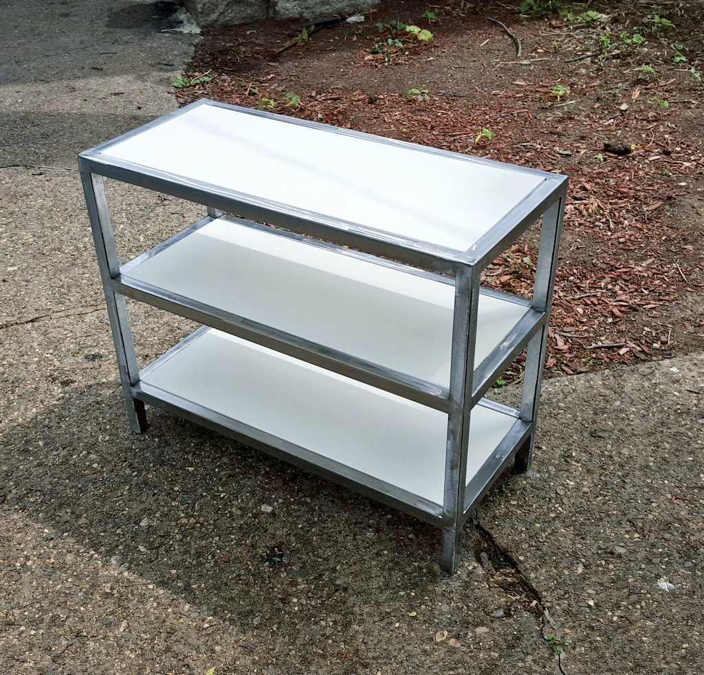 SkullsInd's tweet photo. Finishing a custom shoe shelf for a client in NYC. Features Corian® and welded steel. https://t.co/TZb6G3quXx