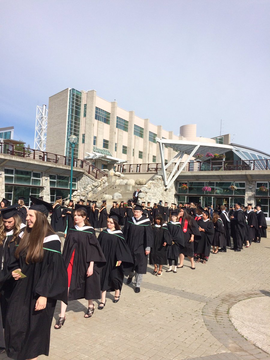 UNBC's tweet photo. Grads marching towards @NorthernSport for #UNBCconvocation #UNBC2016 Congratulations!! 🎓 https://t.co/hvicmbzbYi