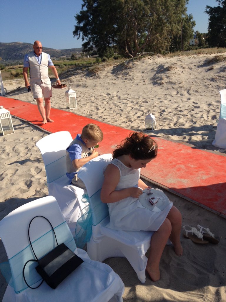 ryanmckay77's tweet image. Elin and Lloyd enjoying their cake! : )