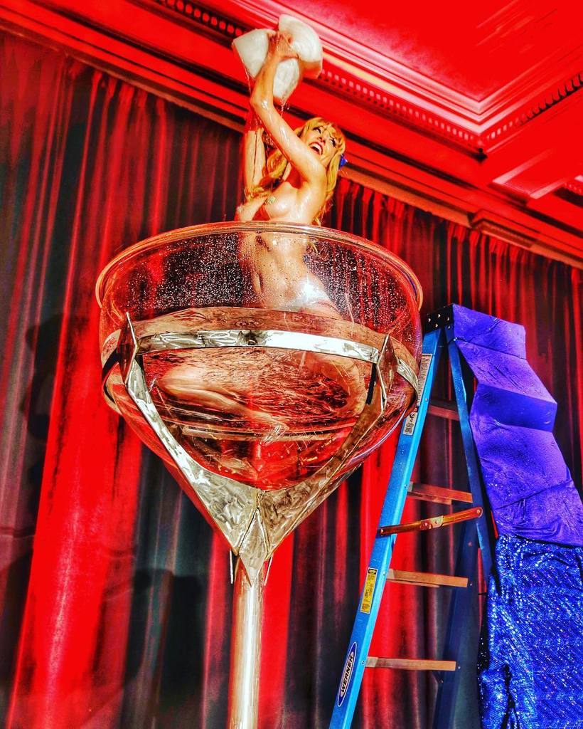 Chris Granger on X: Burlesque starlet Trixi Minx dances in a giant martini  glass at last year's The Big Gateau…    / X