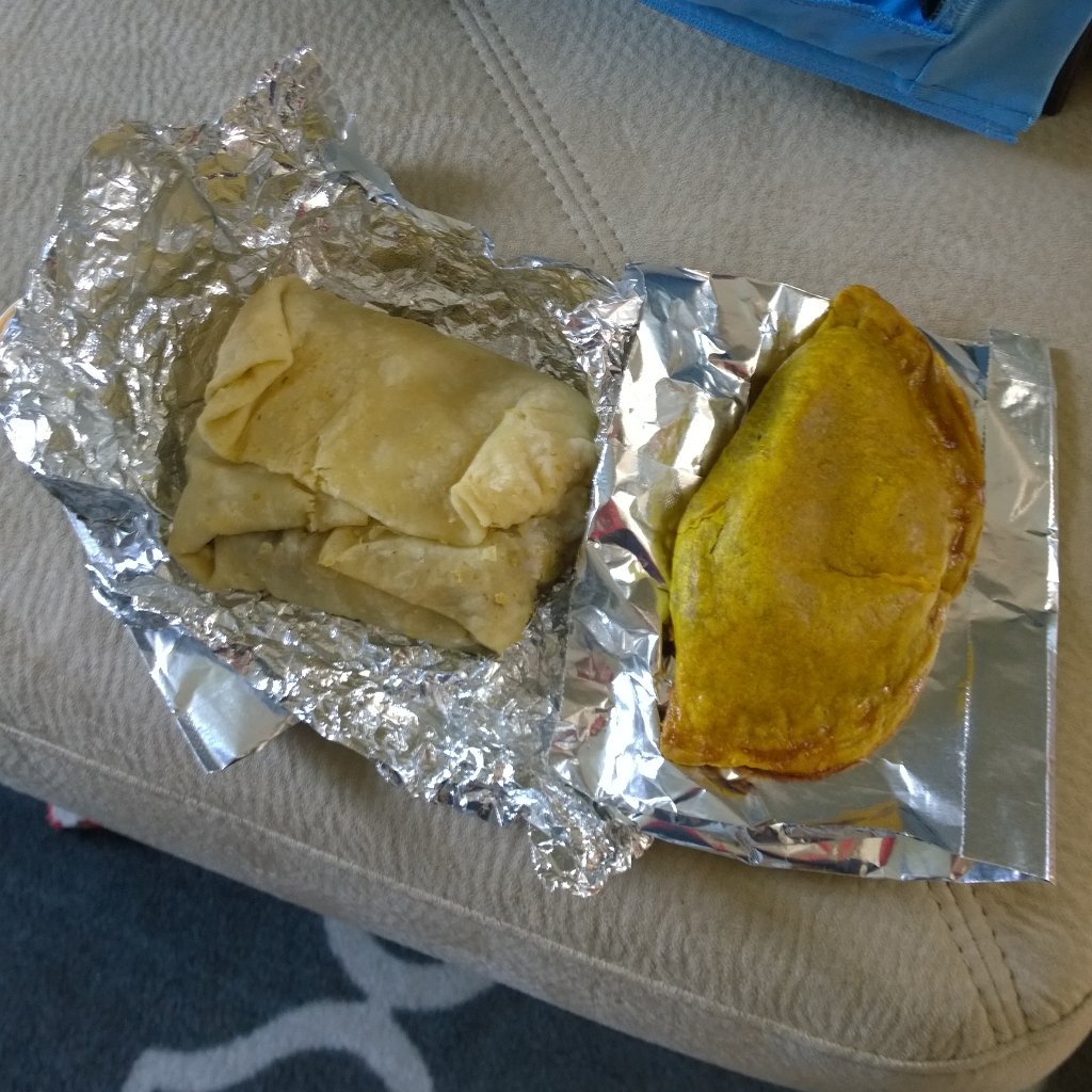 deepfriedpish's tweet photo. Thanks @rucaribbeanme for the roti and patty. Shout out to Dane, he makes the best patties in the city. Bup!Bup!Bup! https://t.co/D8XqruCM9z