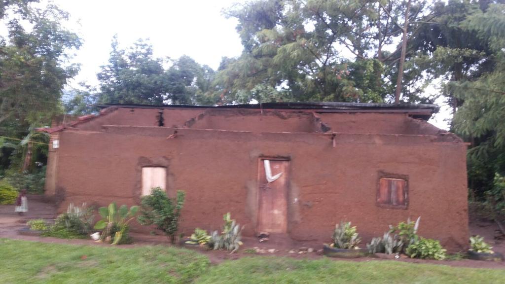 Owners of this house in Bundibugyo are confused after a strong wind blew off the roof in a heavy down pour last nyt.