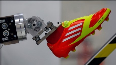 CBCNews's tweet image. If sweatshops are bad, are roboshops better? ift.tt/1XYMgUX