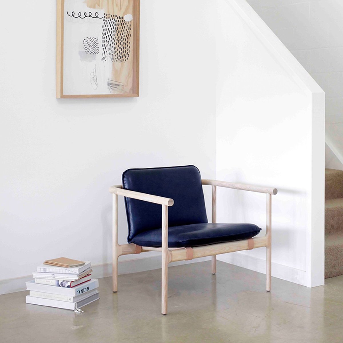 Dubaidesignweek's tweet photo. #DesignAustralia Canberra-based Tom Skeehan with his Hoshi armchair. Simple & fluid, inspired by Japanese influences https://t.co/Nj3WVKzaVy