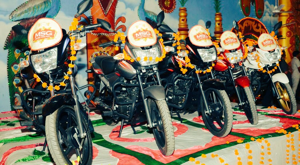BollywoodHonk's tweet photo. Do u think Baba @Gurmeetramrahim is really a #modernbaba coz y'day he distributed Bikes,cars,refrigerators as gift. https://t.co/jFcfqZLSqE