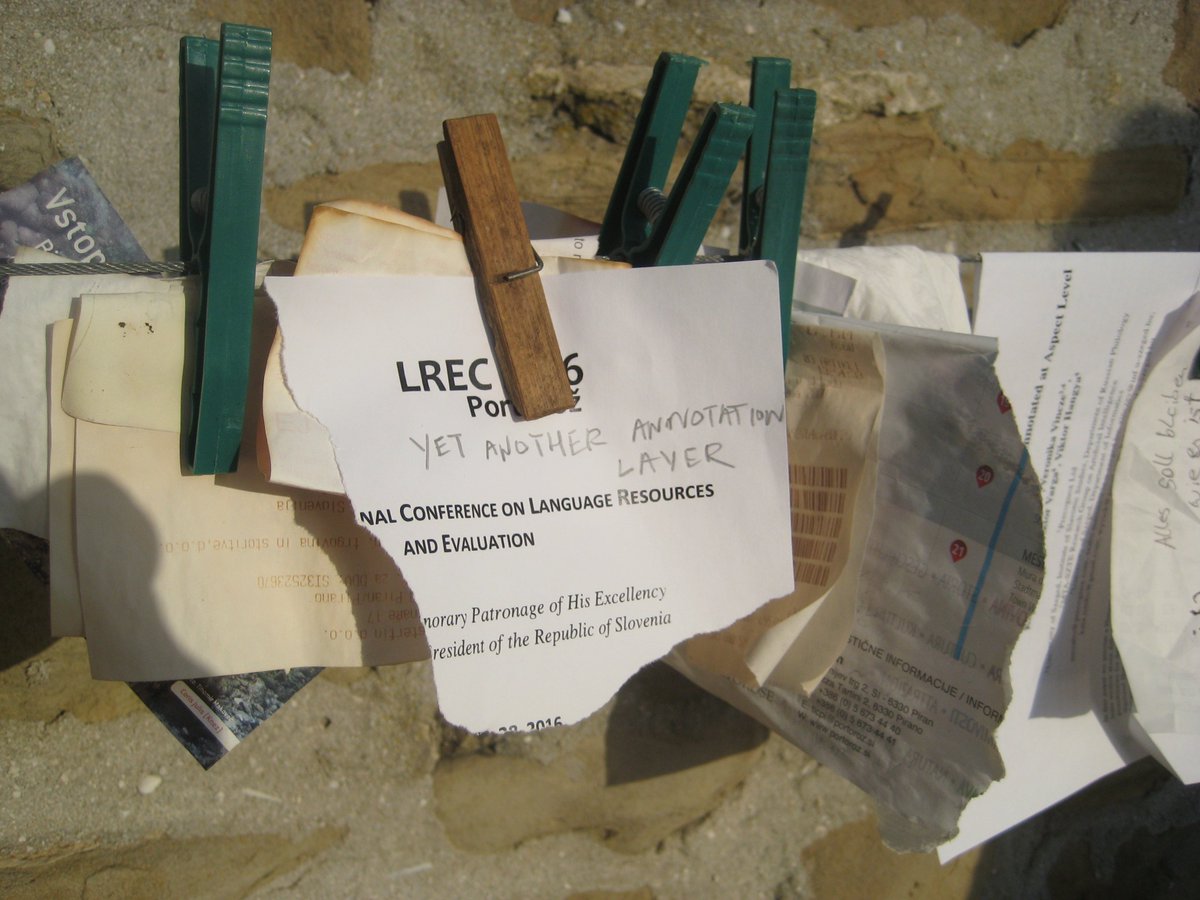 Logological's tweet photo. #LREC2016 participants are adding annotations to a public message board on the Piran city walls. https://t.co/eUOjBOh4Po