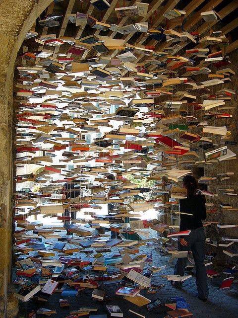BookAddictUK's tweet photo. It's raining books! #ImprobableLibraries https://t.co/jepX4tO567