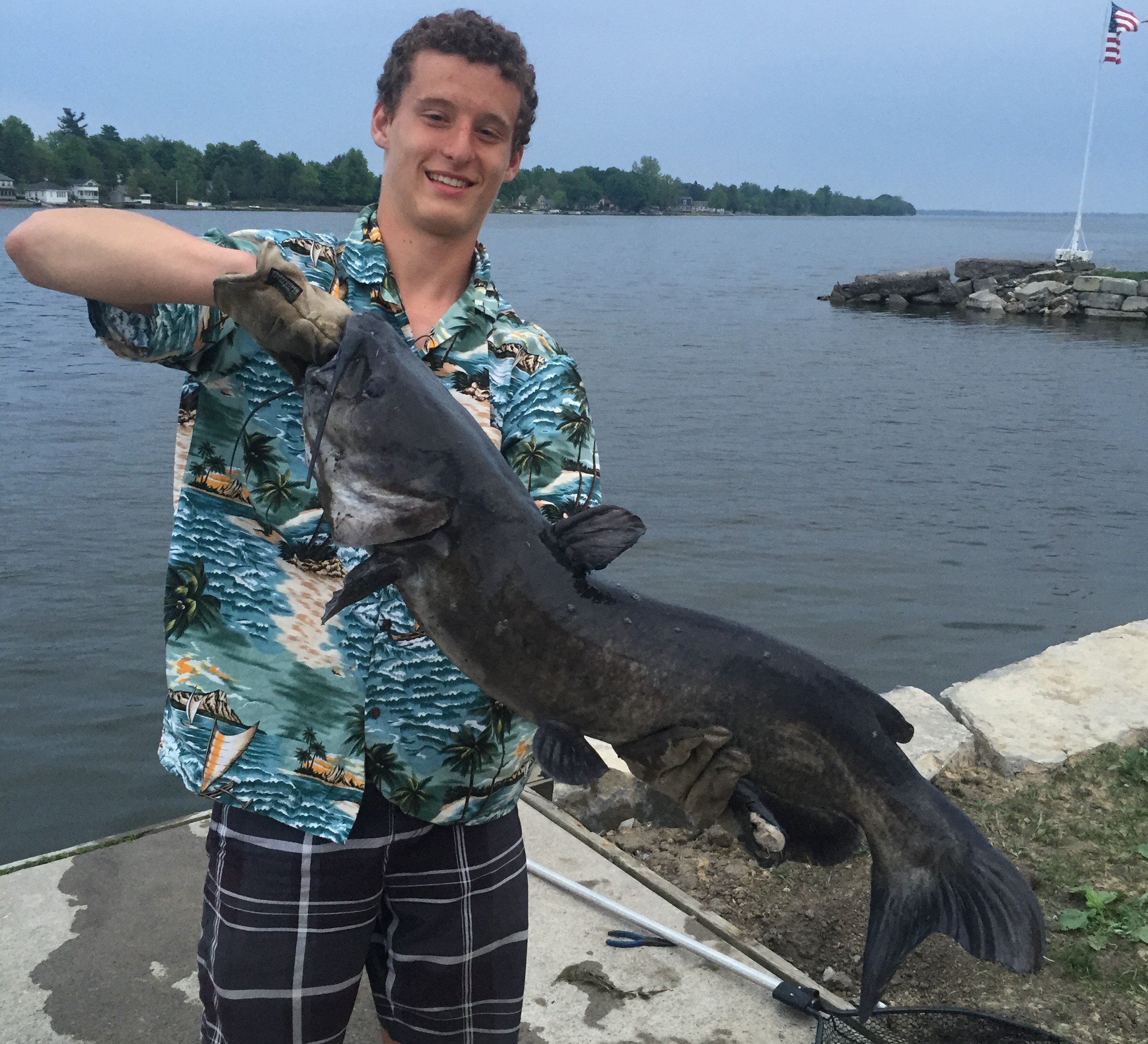 David Figura on X: Teen catches huge Lake Ontario catfish on