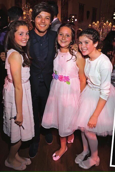 the1Dscene's tweet image. Louis and Danielle at Jamie Vardy&apos;s wedding.