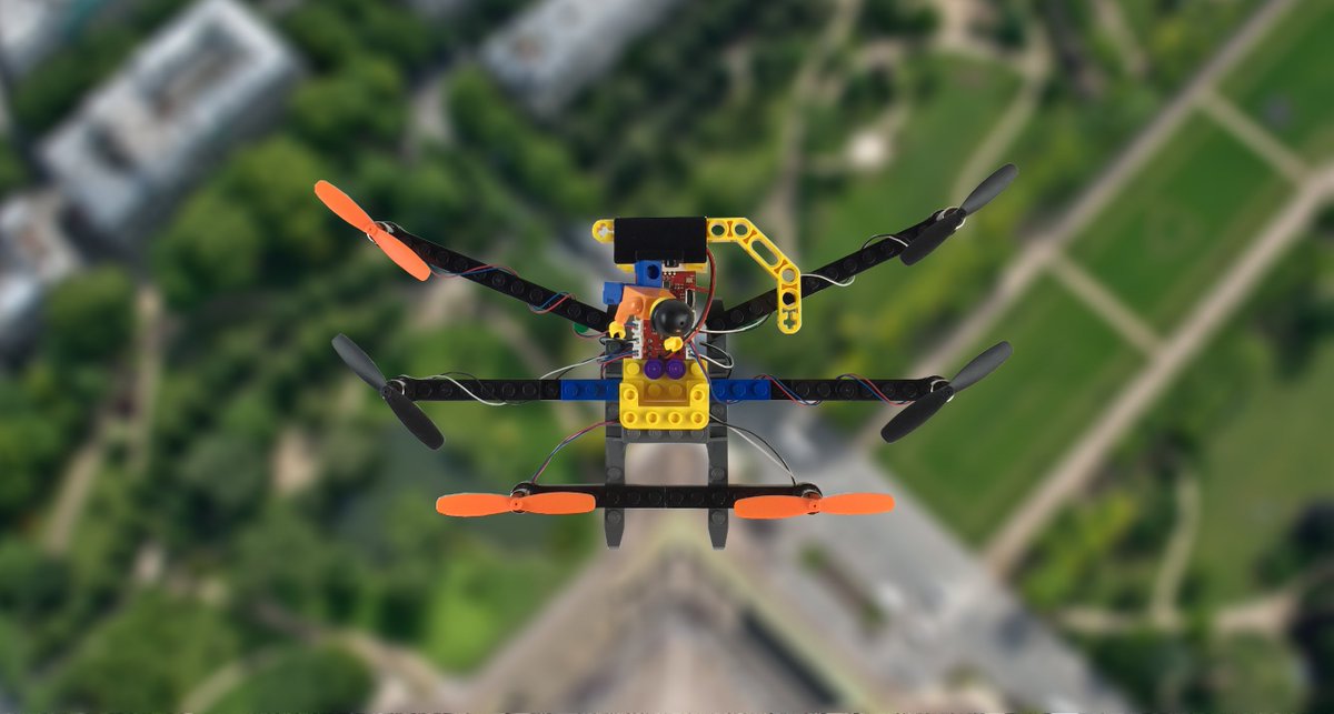 Flybrix's tweet photo. We had a little fun putting our hexo build in a fake scene flying from the top of the Eiffel Tower.  Someday, maybe! https://t.co/TzkyzrSXCQ