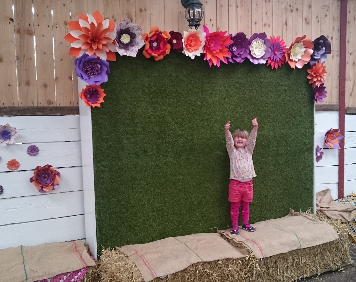 Thumbs up from the boss #flowerwall #photobooth #paperflowers #weddingideas #barnwedding #rustic #weddingphotos