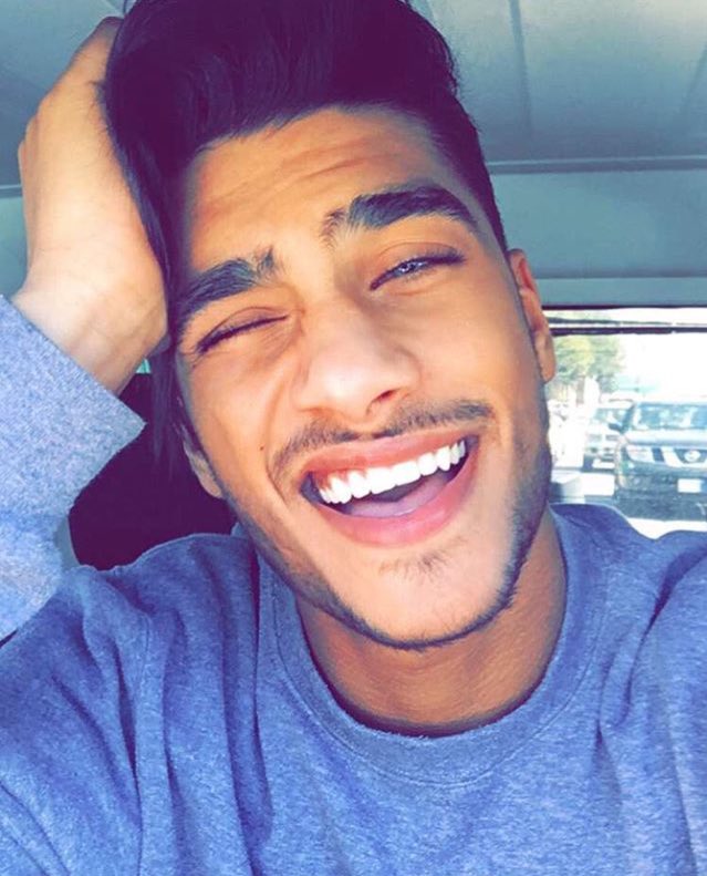 alexwhatt's tweet photo. This is me trying to be happy while dealing with a headache https://t.co/6tFXPRYaV4