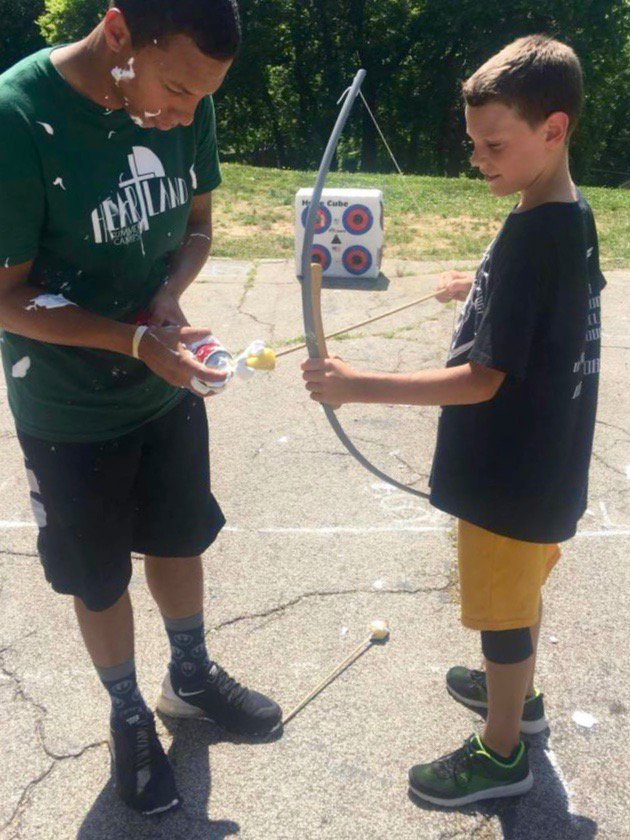 HeartlandCenter's tweet photo. Camper Caleb is excited to give shaving cream archery a try! #DayCamp #CourageousFaith #SummerAtHeartland https://t.co/3xlzv58puG