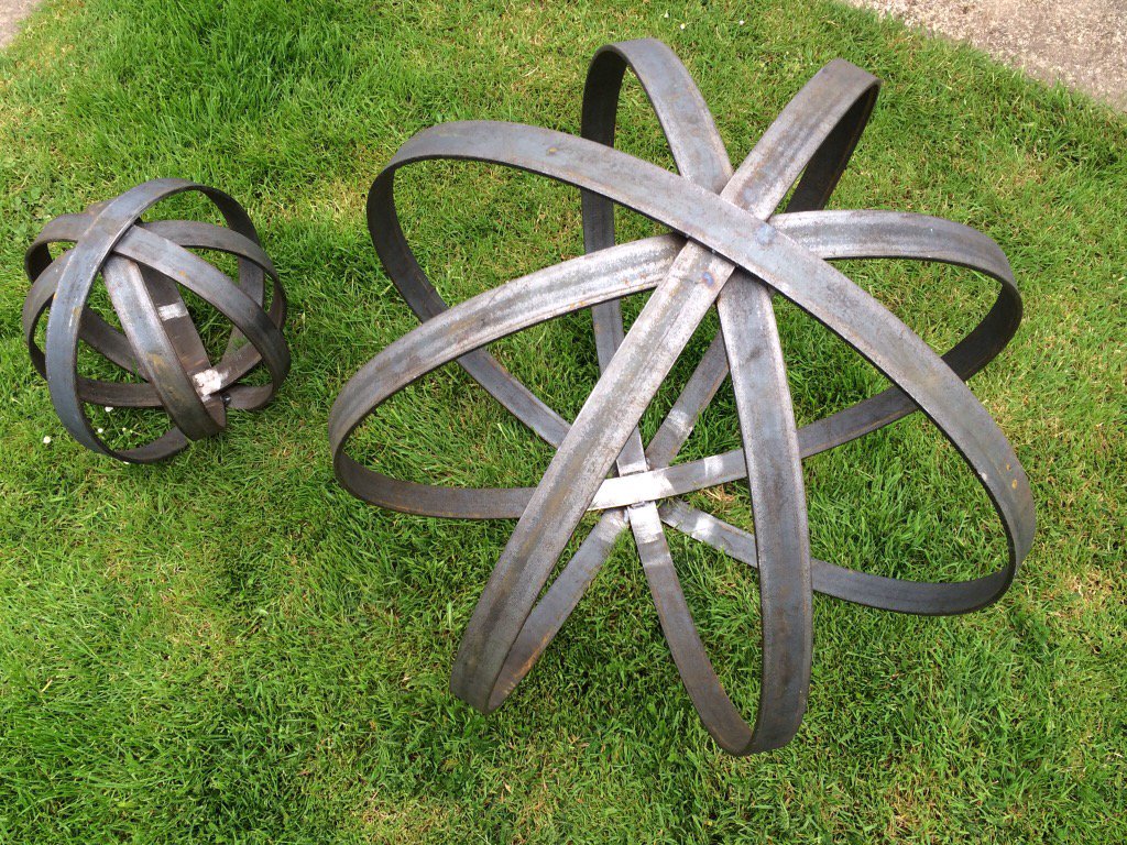 grobblacksmith's tweet photo. Globes for the garden https://t.co/bdIuvosjfD