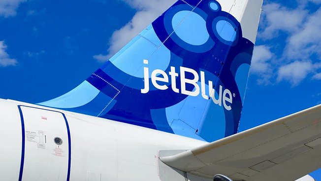 Adweek's tweet photo. .@JetBlue is providing free flights to Orlando for families of shooting victims: https://t.co/Zk12vBLV4W https://t.co/aHT1wNoxGE