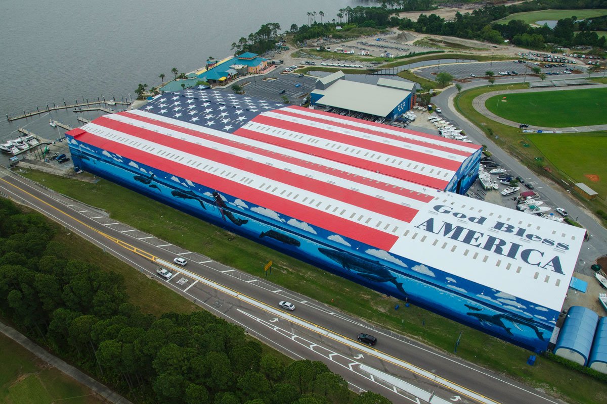 SWPaintPros's tweet photo. We salute the world’s largest painted flag, spanning 3.8 acres atop the Legendary Marina! Happy #FlagDay, America. https://t.co/inTo3LJVOj