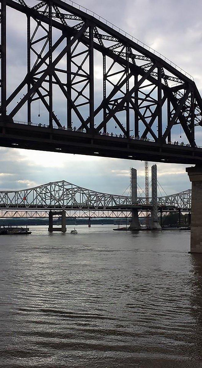 GoSoIN's tweet photo. One river, two states, walk or bike @BigFourBridge when you #VisitSoIn #TravelTuesday https://t.co/sDWVBgntNQ https://t.co/A8QhABodKC