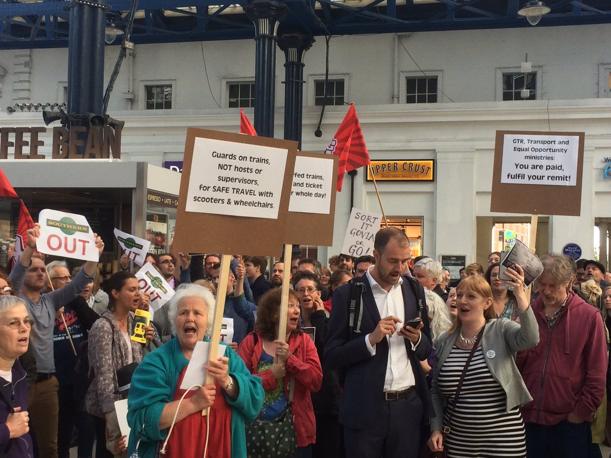 Protestors rally against <a href="/SouthernRailUK/">Southern</a> as managers look down from on high #southernfail #southernout