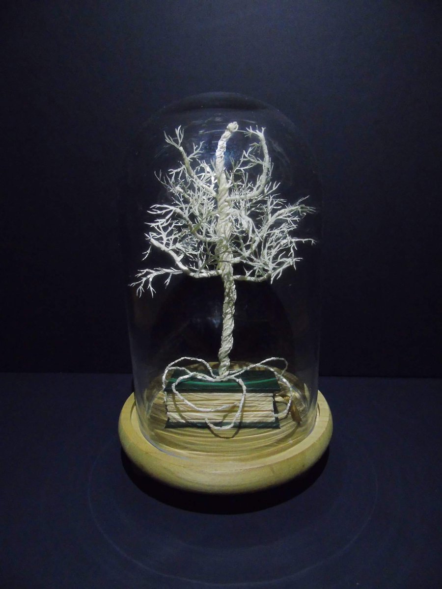 TBevan2's tweet photo. First completed piece in a while, Leaves are Dead #bookart https://t.co/4qBniA66Uf
