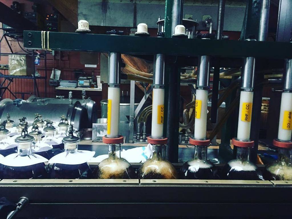 Bottling &amp; hand labeling @blantons_bourbon at @buffalotrace distillery, our 2nd stop on th… ift.tt/1OnTyzw
