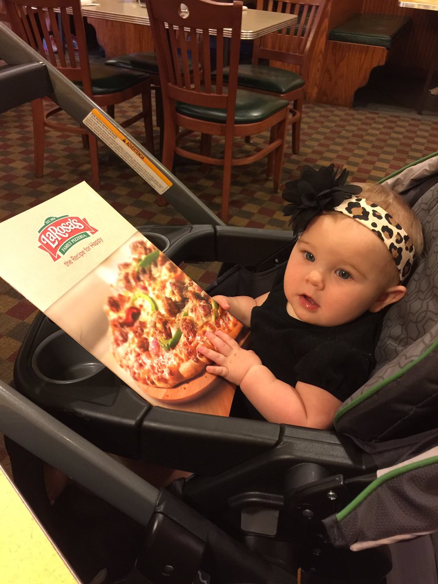 KurtReiber's tweet photo. Lily's first visit to @LaRosasPizza and she is trying to decide Calzone or Personal Pan Pizza! #DeliciousDecisions https://t.co/1s8A8AKhjG