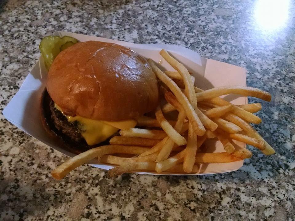 Jeramymn's tweet photo. $2.00 burger baskets only at the Triple Play in Dent #tripleplay #greatfood #goodservice. https://t.co/QLfoA5m1Zf