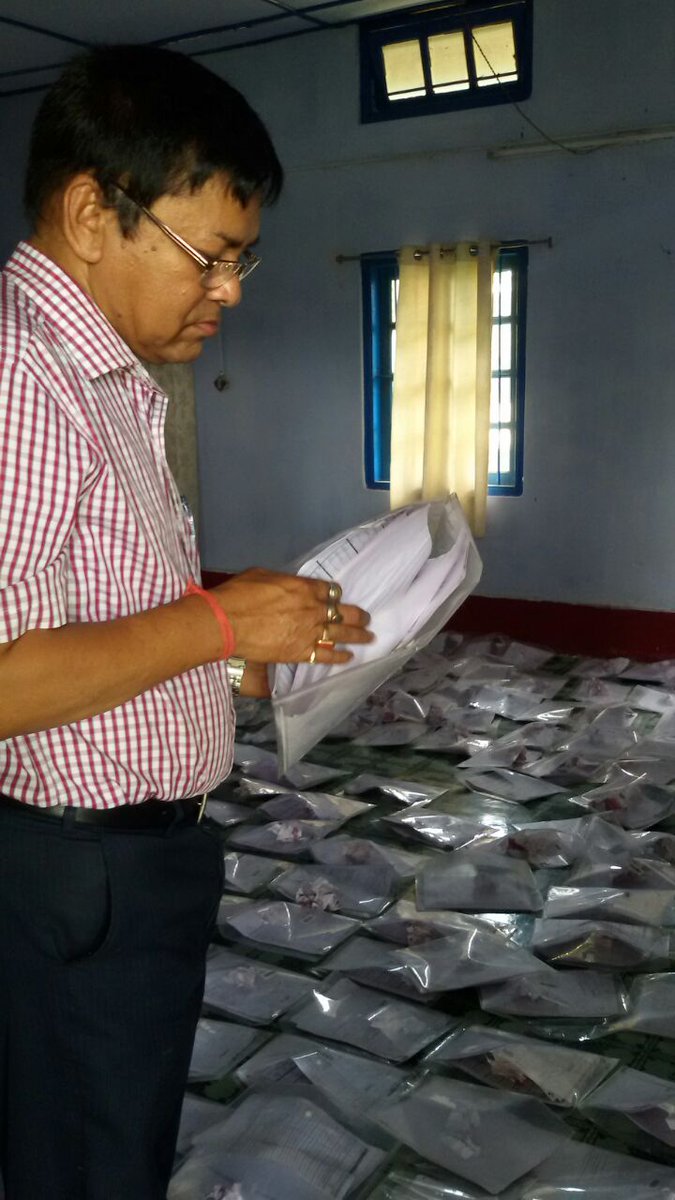 NRCupdateAssam's tweet photo. ADC #Hailakandi, Shri #AmalenduRoy quality checks the digitized application forms at Circle Office #Algapur recently https://t.co/KYsNds0oXZ