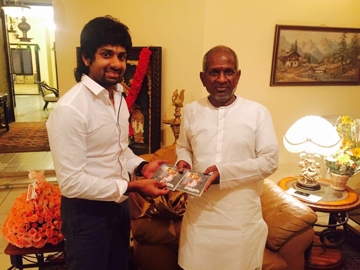 A dream come true picture with the maestro on his birthday, holding the audio CD of Kaathadi!