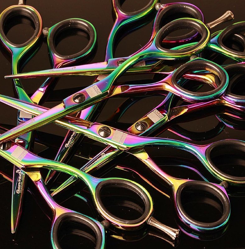 EVO Iridescent scissor available in 5.5" #hairdressing #hairdressinglife #salonlife #barber #barbering #barberlife