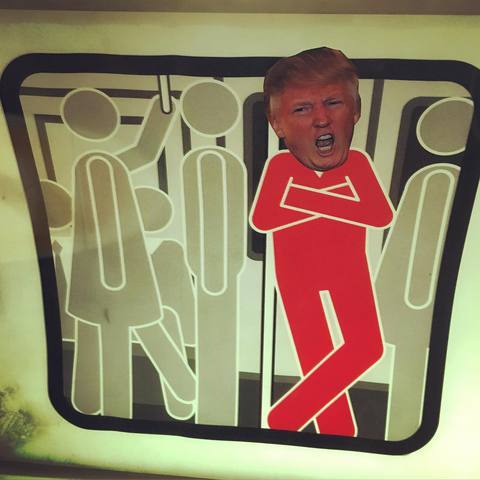 JoshuaLambier's tweet photo. Thousands of Trump Head Stickers Embellish MTA Stick Figures on the Subway #StickerActivism
https://t.co/FxnfZaeoCr https://t.co/xFyp8RMhGU