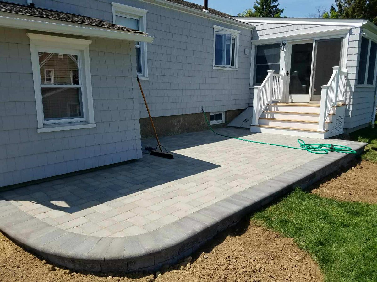 New Patio w Unilock Camelot pavers in new color - Almond Grove. Brussels Dimensional wall system &amp; full nose coping!