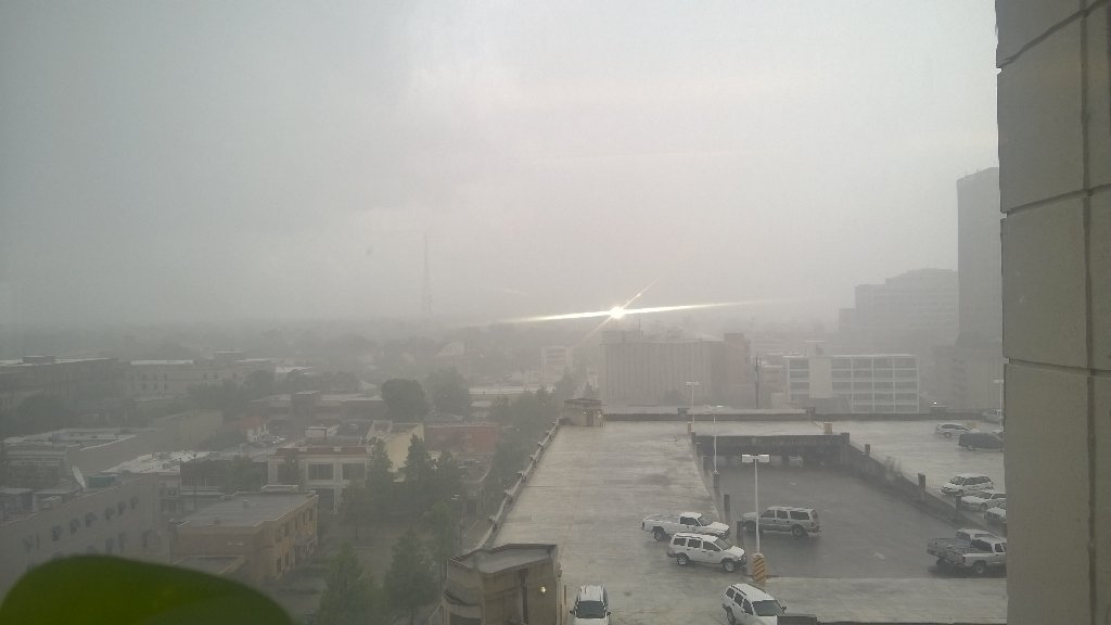 CrystalAccardo's tweet photo. Rain clouds over #LSUtigerstadium headed downtown just minutes ago. Rain is here now @Jay_WAFB @WBRZweather @wb https://t.co/a3CF2CgbnI