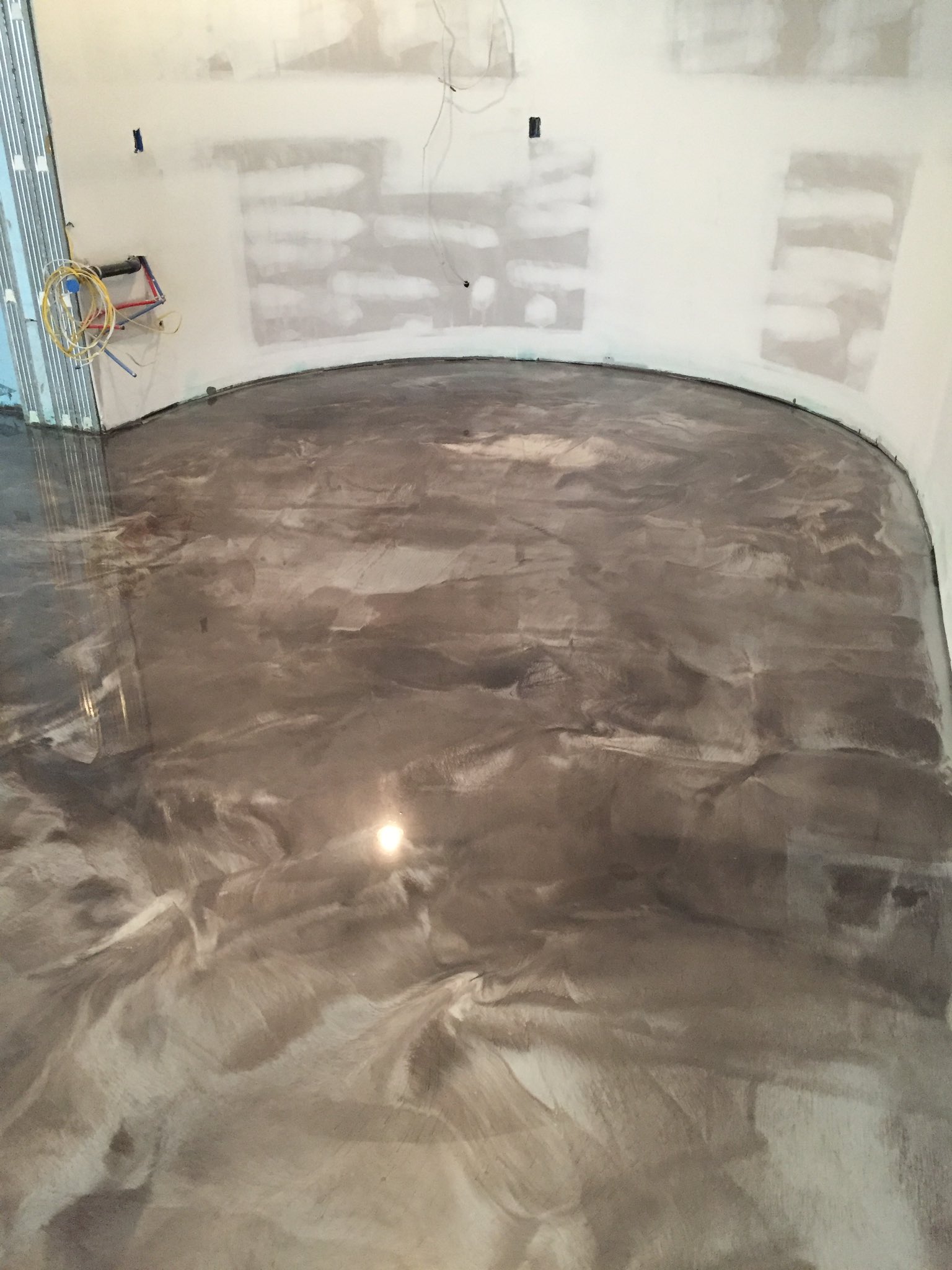 Titanium & brass shop metallic epoxy floor