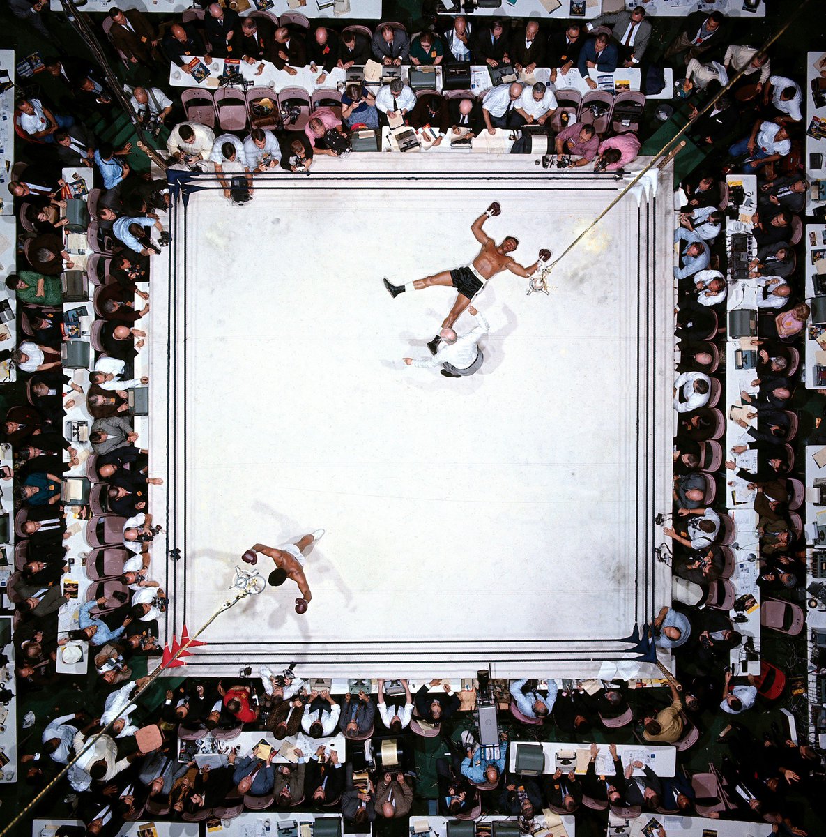 AntiqueFootball's tweet photo. Voted the best sports photo ever in 2003. Ali celebrating victory over Cleveland Williams, 1966. Photo: Neil Leifer https://t.co/bSNjB1qR5J