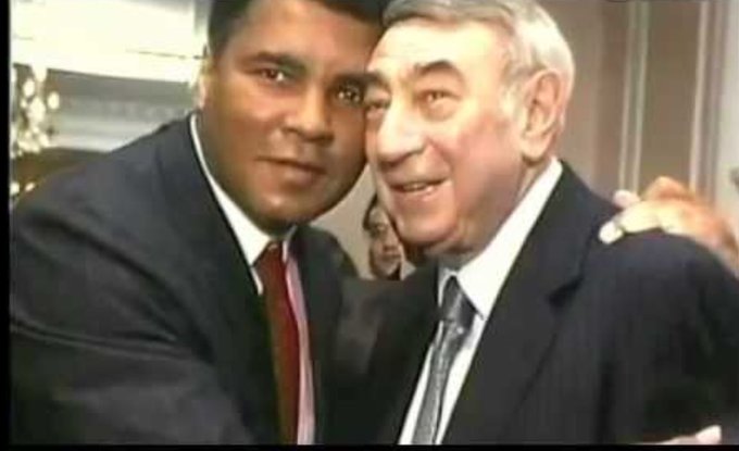 3 pic. Reunited, #MuhammadAli & #HowardCosell. Wish we could hear the stories they're telling now. #GreatestOfAllTime