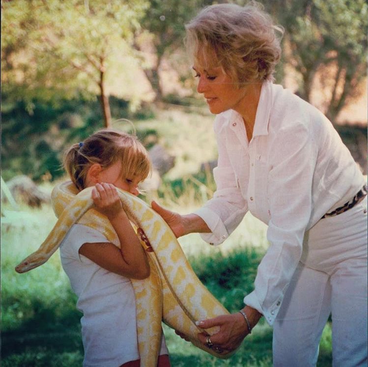fiftyshadeshk's tweet image. Melanie on Instagram: "Dakota and Tippi with Petie the Python, our pet circa 1995 #totallysafe 😎😎😎"