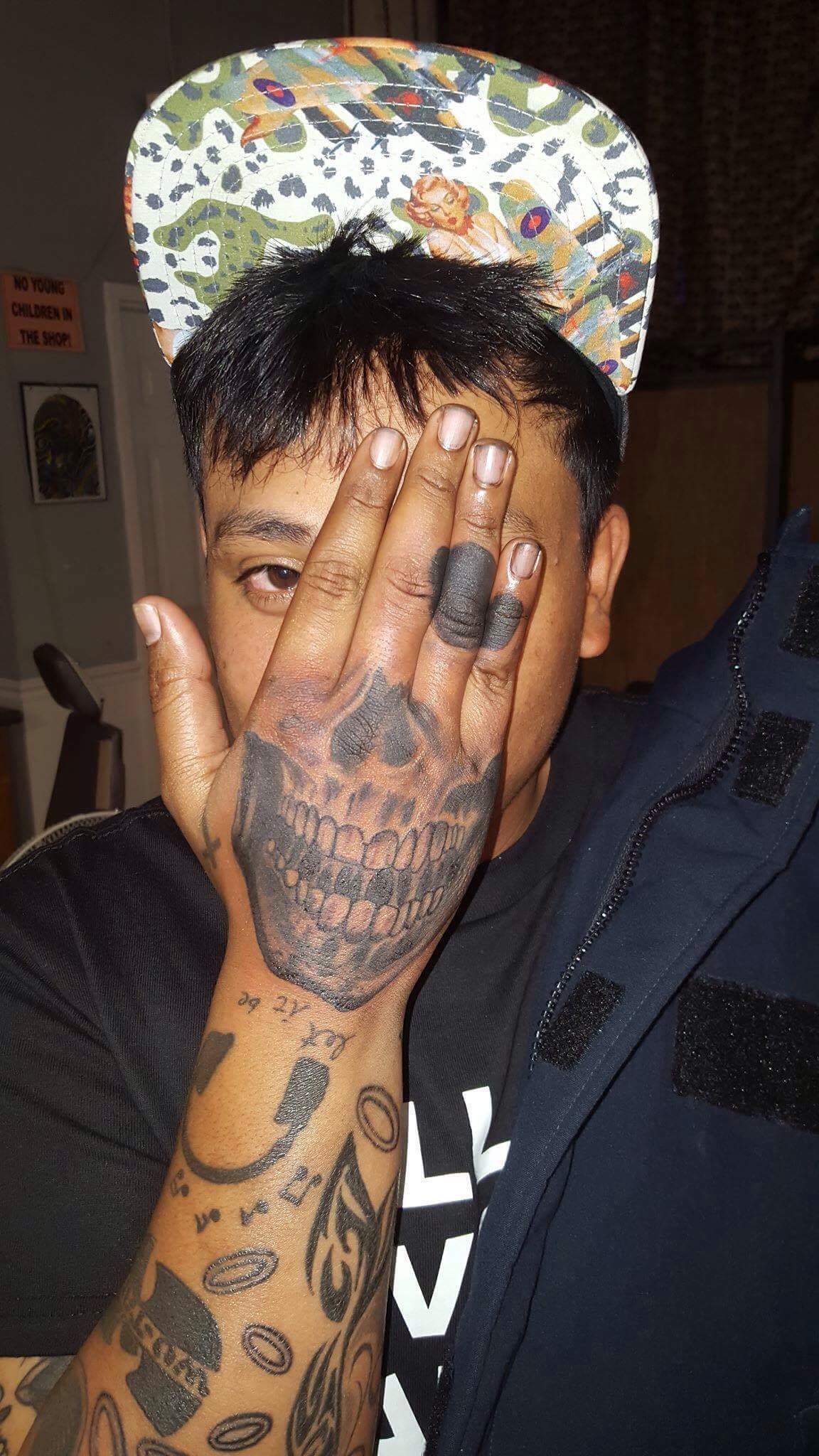 lv ski mask tattoo