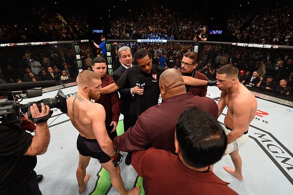 The_Fight_Buzz's tweet photo. Conor McGregor vs. Nate Diaz Rematch to Headline UFC 202 - https://t.co/11Nm7a0yxD #UFC202 https://t.co/XWP0G4f66S